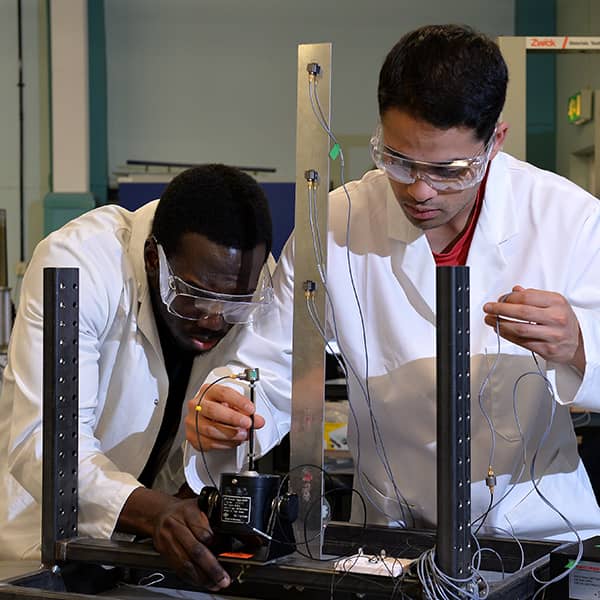 Two students working on a project in the Department of Mechanical & Aerospace Engineering.