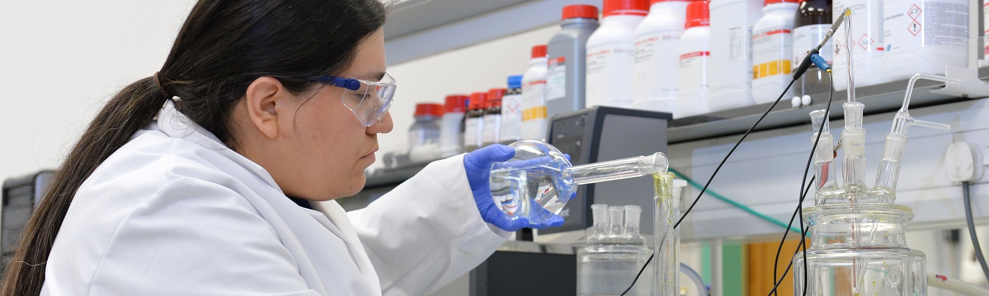 Student in chemical engineering lab Student in chemical engineering lab