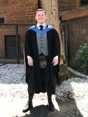 Lewis Creechan in his graduation gown