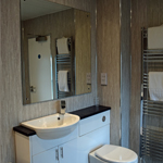 Family bathroom at Ross Priory with bath and separate walk in shower