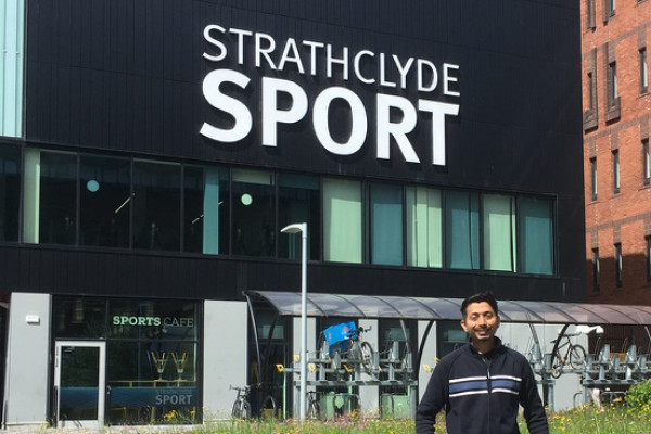 Arif Hasan standing outside the Strathclyde Sport building.