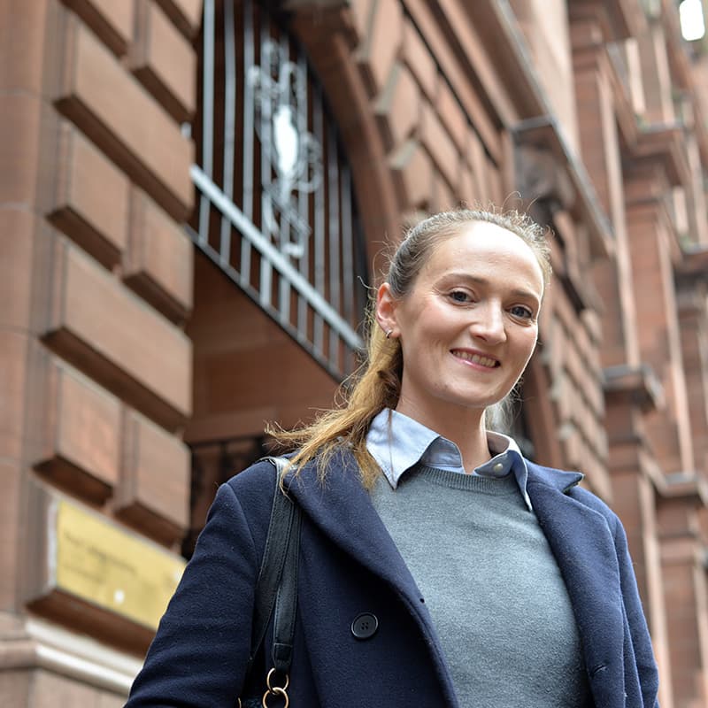 Kellie Barnes, Marketing exchange student from RMIT Melbourne, Australia, outside the Royal College building