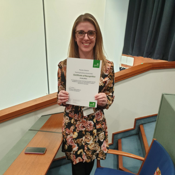 Dr Ainsley Miller with her TEA certificate