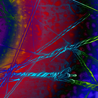 A colourful microscope image showing twisting crystals of the drug oxcarbazepine