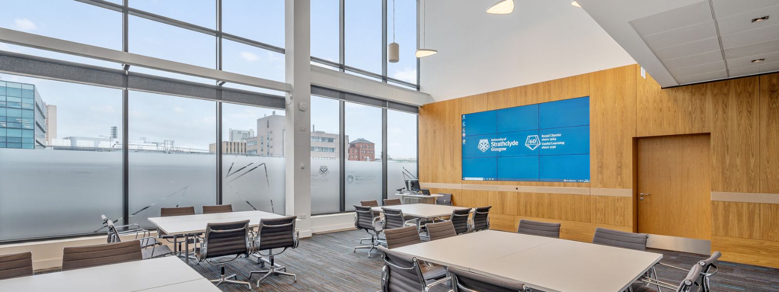 Executive Suite set cabaret style, facing the videowall. Photo Lucy Knott Executive Suite set cabaret style, facing the videowall. Photo Lucy Knott