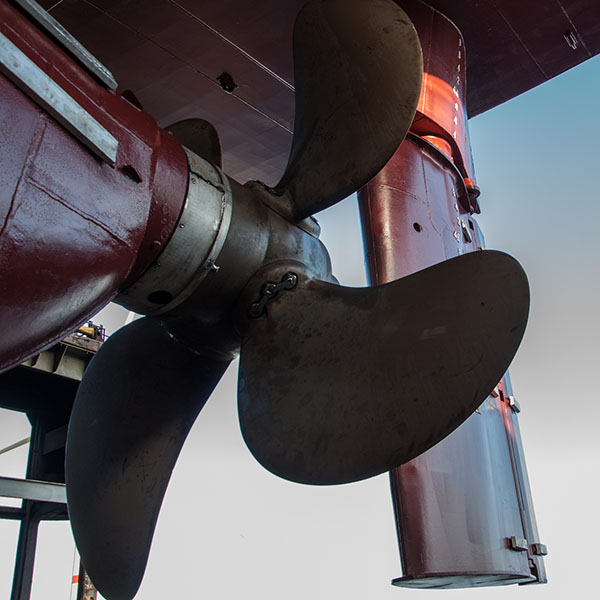 close up of ship propeller and rudder close up of ship propeller and rudder