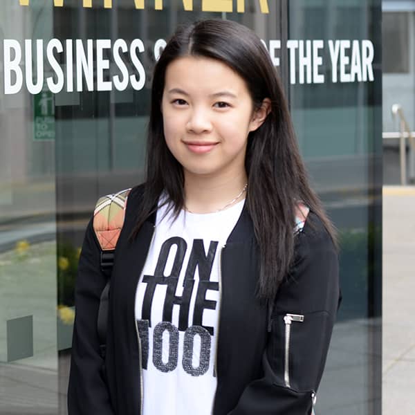 Mathematics student, Jessie Sou, standing outside the Strathclyde Business School