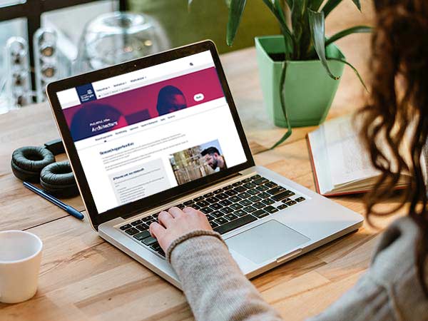 Person browsing the University of Strathclyde website. Person browsing the University of Strathclyde website.