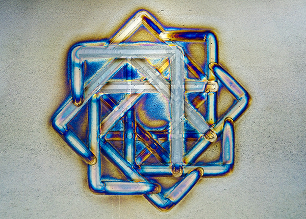 An artistic geometrical image made by an arc-welding robot