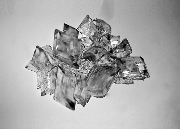 A black and white image of a crystal formation
