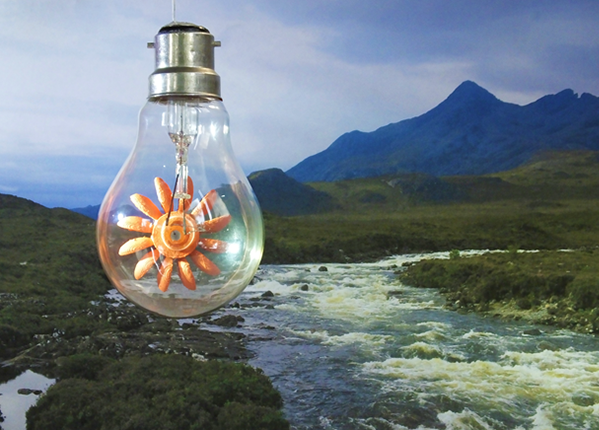 A light bulb containing a turbine hanging in mid-air above a stream leading to mountains