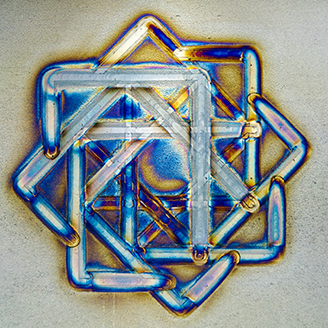 An artistic geometrical image made by an arc-welding robot