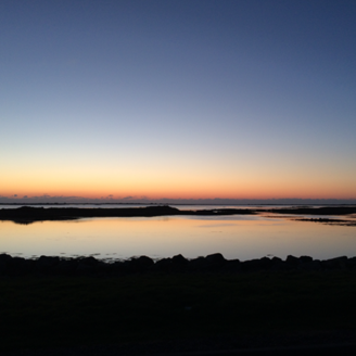 A sunset over the coast