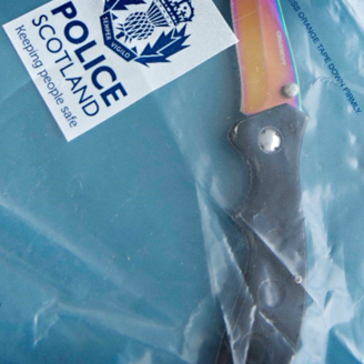 A knife in a sealed police evidence bag
