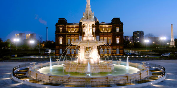 the fountain and the People's Palace in Glasgow Green - a large fountain in front of a beautiful building
