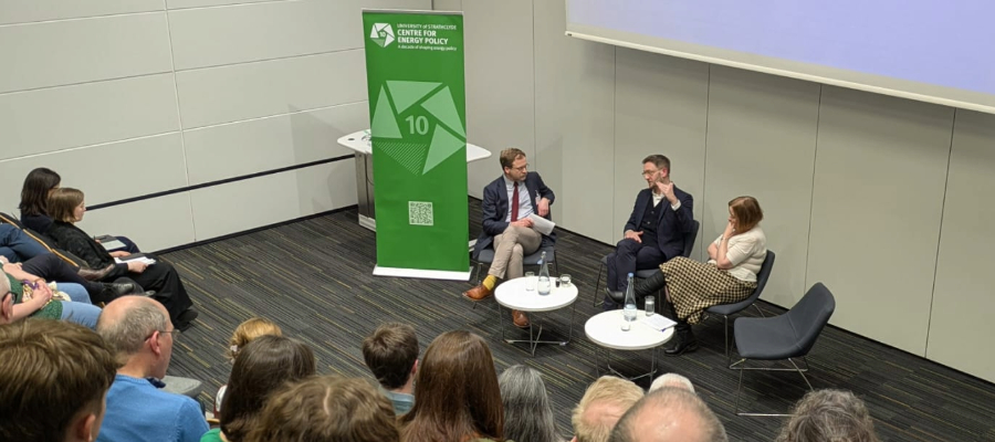 CEP speakers and Chris Stark sitting discussing in front of live audience