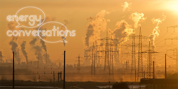 Smoking industrial towers with Energy Conversations logo