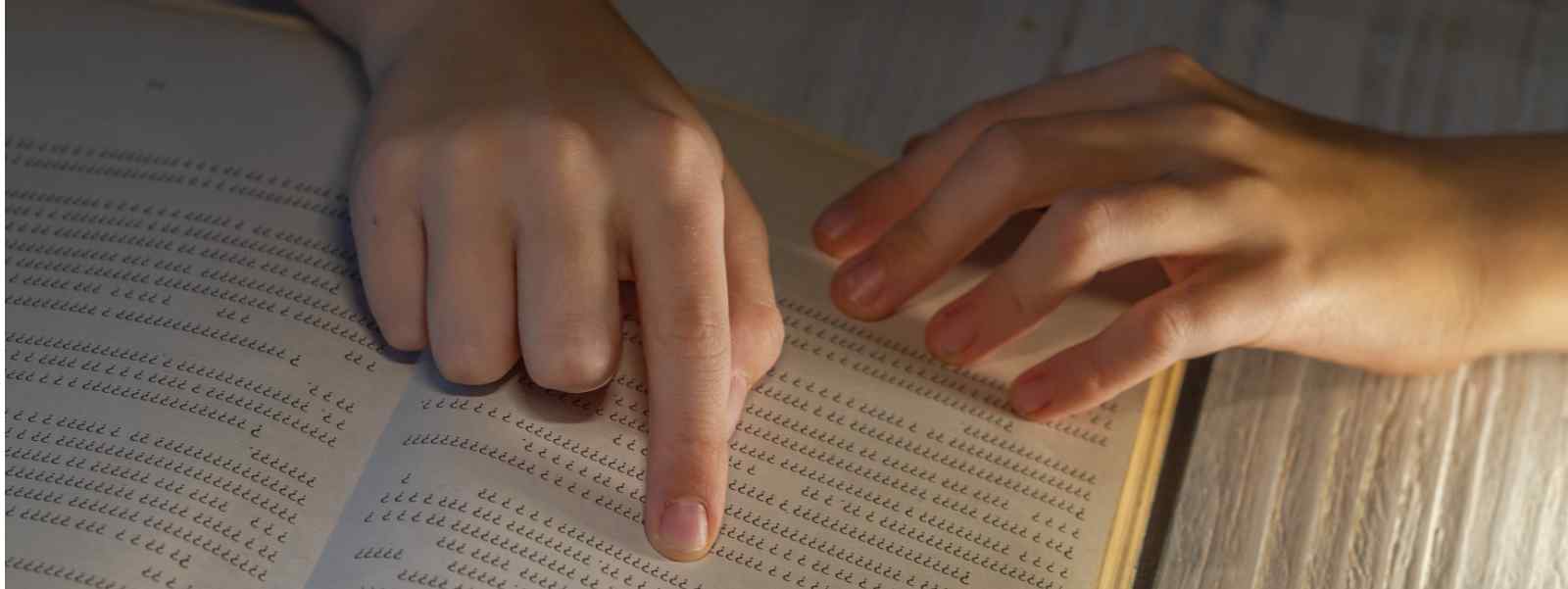 Person with dyslexia reading text Person with dyslexia reading text