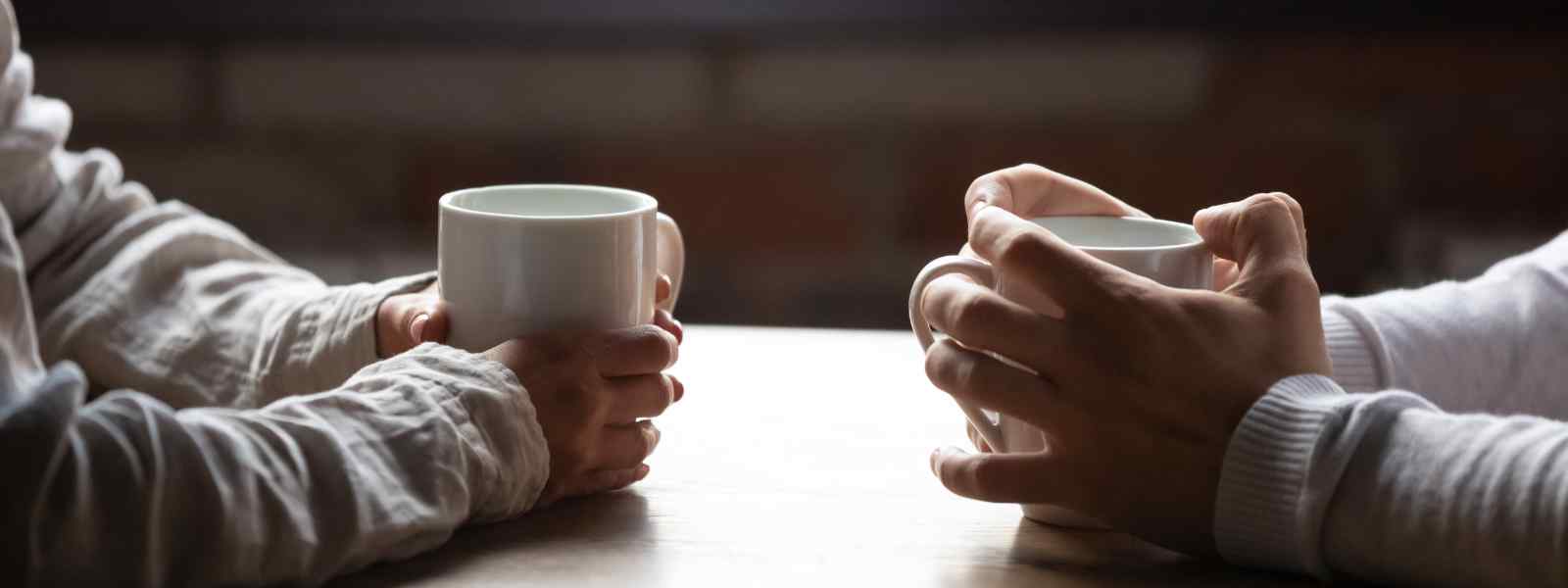 Young people sharing a coffee and talking