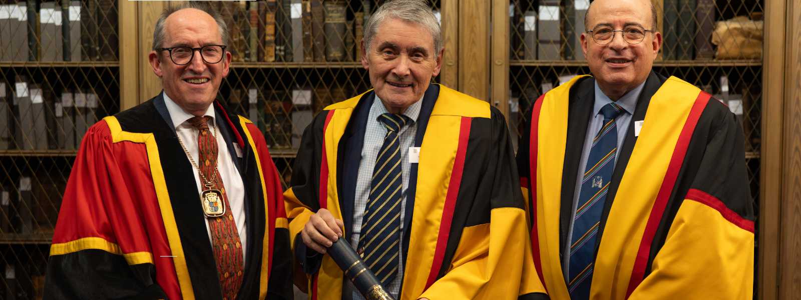 Mr Mike McKirdy, President of the Royal College of Physicians and Surgeons of Glasgow; Sir Harry Burns; Professor Hany Eteiba, President-Elect of the College, who read the citation at the Honorary Fellowship ceremony. The picture was taken in the Lower Library of the College, which is based on St Vincent Street, Glasgow.