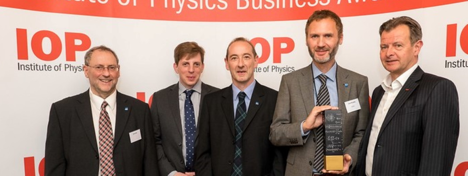 Left to right: Professor David Birch (HORIBA and University of Strathclyde); Richard Hirsch (HORIBA); Dr Graham Hungerford (HORIBA), Dr David McLoskey (HORIBA) and Dr James McKenzie (Vice-President Business, Institute of Physics). Photo by Institute of Physics.