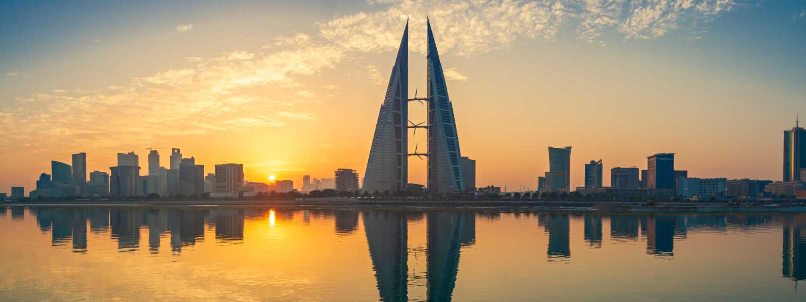 Panorama of Manama skyline at sunset