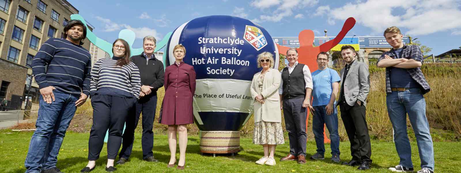 The launch of the SUHABS cold air balloon. Left to right: Sheik Abdul Malik; Maisie Keogh; Vice-Principal Professor Scott MacGregor; Chief Digital and Information Officer Beth Lawton; Associate Principal Professor Eleanor Shaw; Principal Professor Sir Jim McDonald; pilot Douglas Hoddinott; Chris Lawlor of Lawlor Technologies; Ru Wallace VP Community of Strathclyde's Students' Union. Photo by Guy Hinks