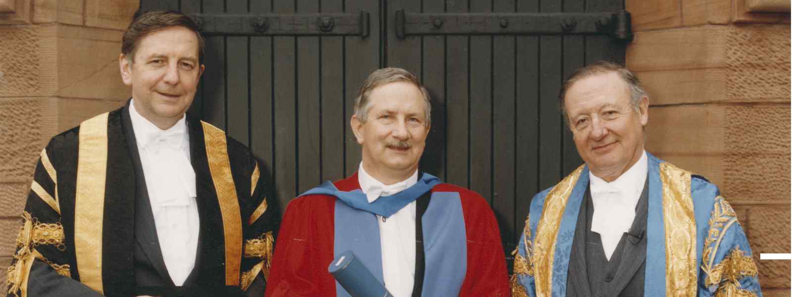 Professor Sir John Arbuthnott (left) in 1992 with then Strathclyde Chancellor Lord Tombs (right) and honorary graduate Jan Krysinski 