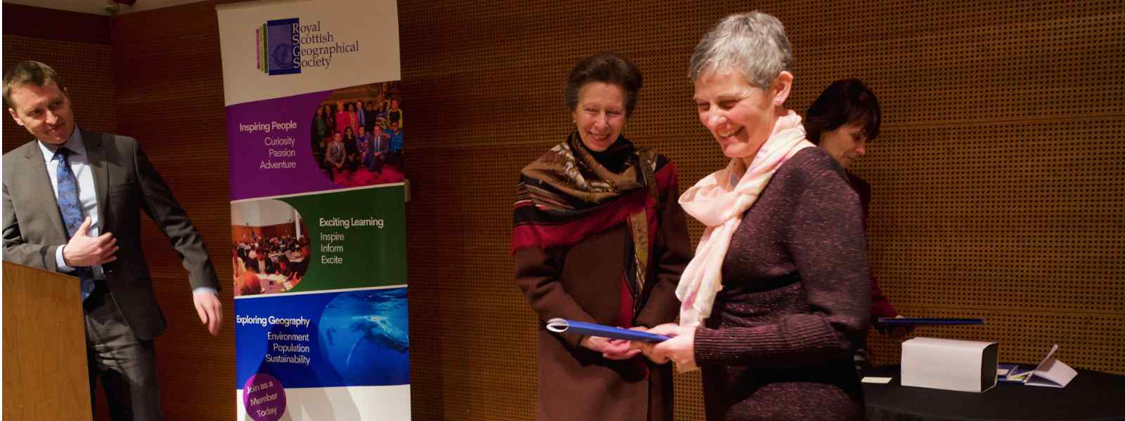 Elaine Blaxter receives her Honorary Fellowship of the Royal Scottish Geographical Society from The Princess Royal. Photo by Colin Woolf for RSGS – Colin Woolf Fine Art   