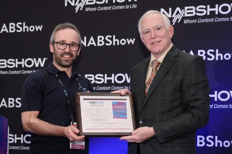 Dr Samuel Yoffe receiving the NAB Best Paper Award 2024