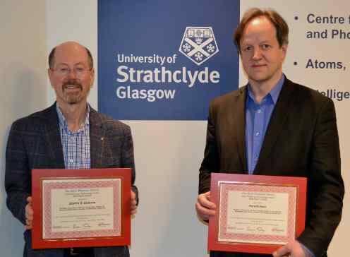 Professor Martin Dawson (left) and Professor Harald Haas with their award certificates