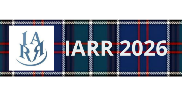 A conference logo for IARR 2026 on a tartan background