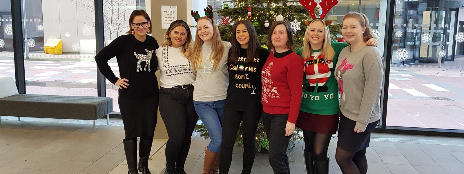 TIC staff wearing Christmas jumpers for charity