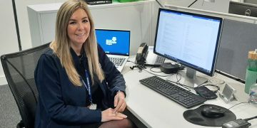 Conference and Events Officer Sarah McLeary sits at her desk in the Technology and Innovation Centre