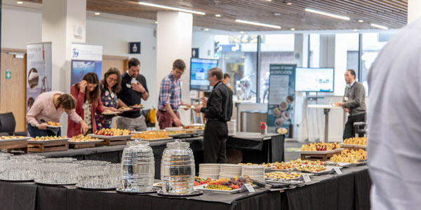 Delegates helping themselves to a buffet in Level 2 Foyer of the Technology and Innovation Centre.  Photo: Lucy Knott