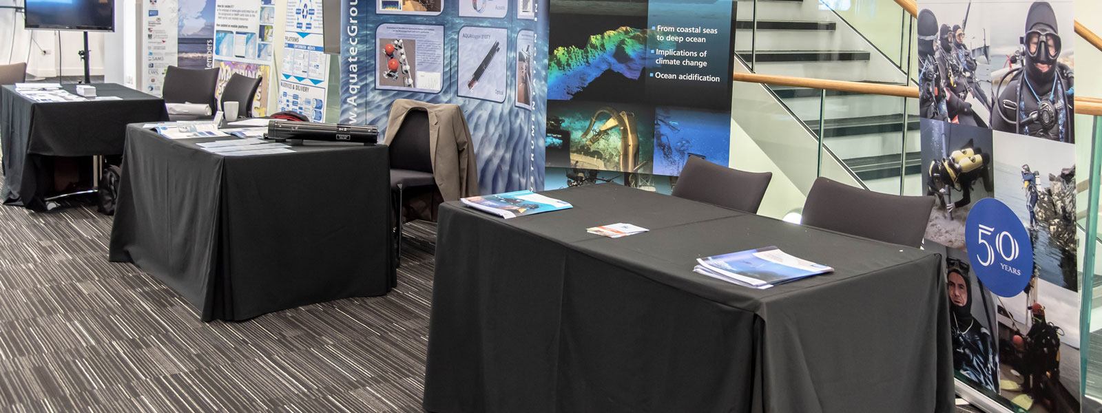 Exhibition tables set up in Level 2 Foyer in the Technology and Innovation Centre.  Photo: Lucy Knott