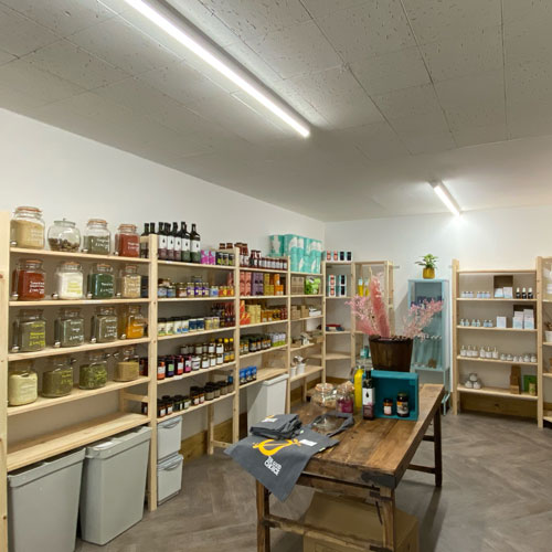 package free items sitting on shelves in a zero waste store