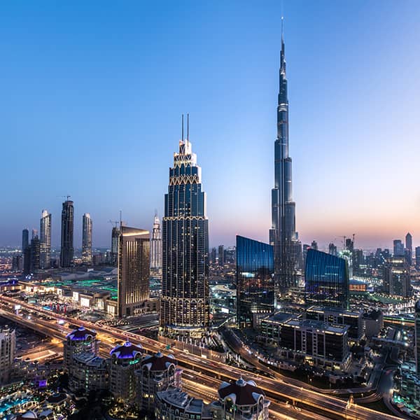 Rooftop view of Dubai after sunset.