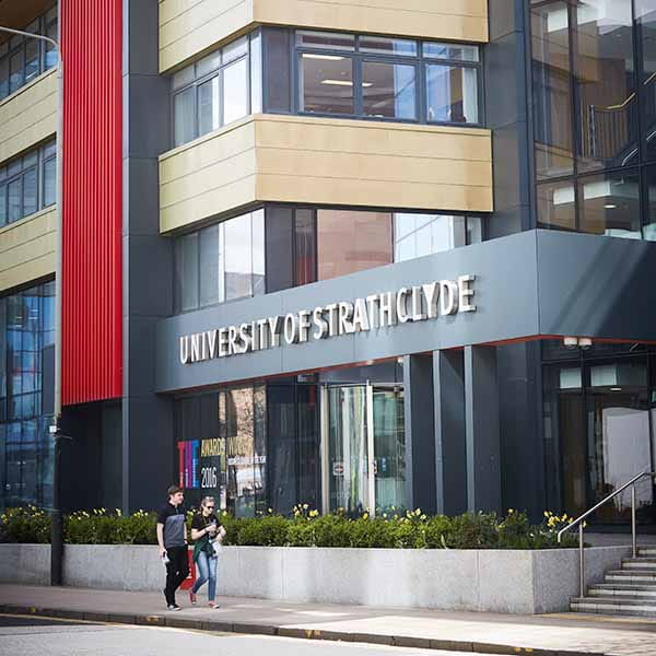 Exterior of Strathclyde Business School with students walking past