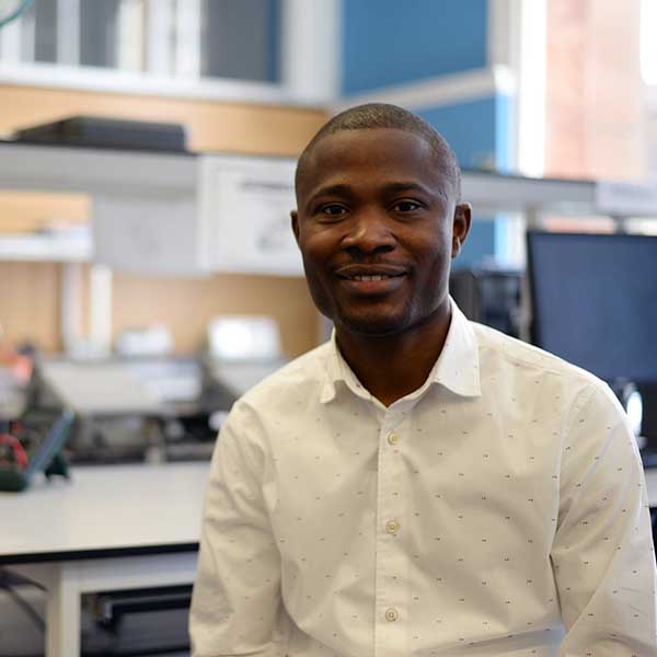 Nigerian student David in the electronics lab