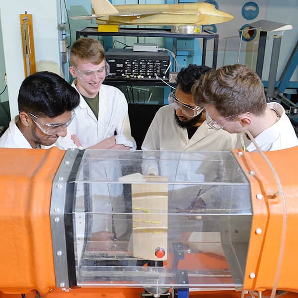 Students working in the Mechanical & Aerospace Engineering department's wind tunnel