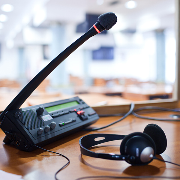 Microphone and headphones on desk