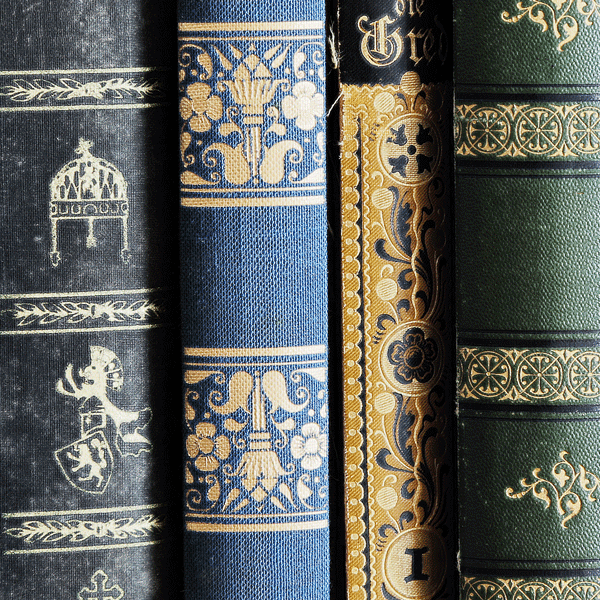 Old books spine facing toward camera