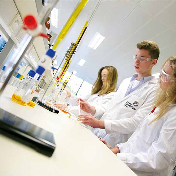 Students working on an experiment in a lab