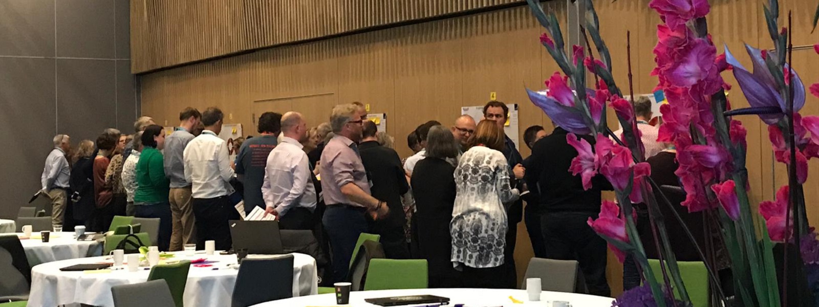 People participating in a group activity at a conference