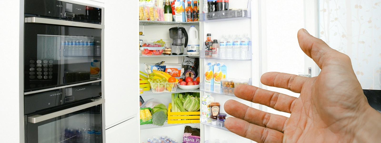 Hand pointing to fridge 1600 x 600