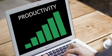 A laptop with a productivity graph on display