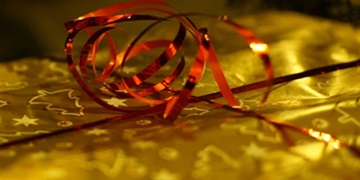 A Christmas gift wrapped with a bow