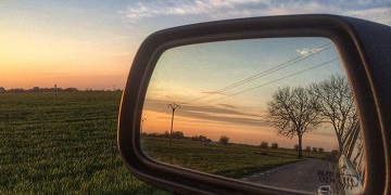 View from the wing mirror of a car