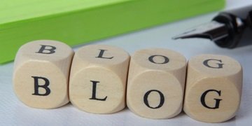 Wooden letter blocks spelling the word 'blog'